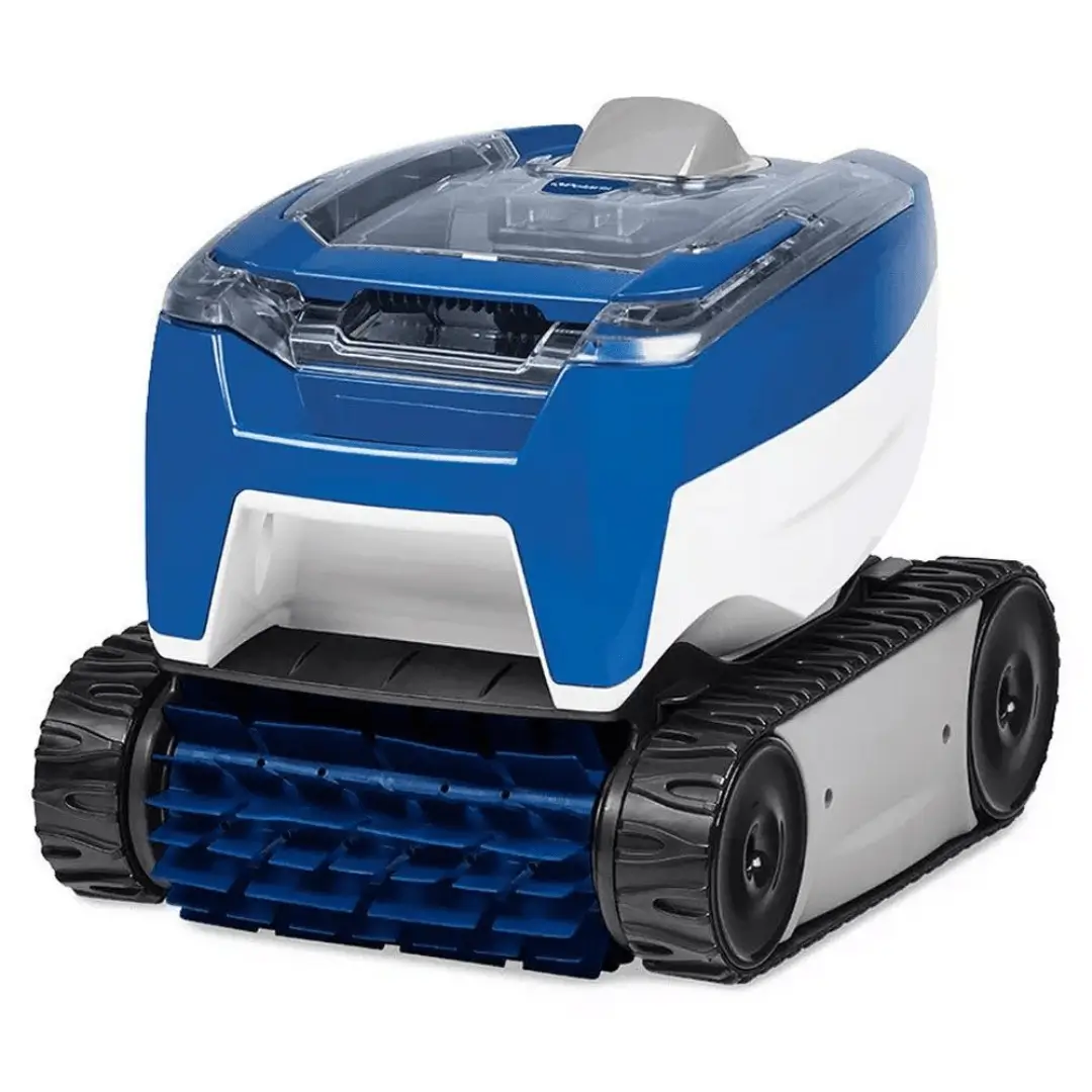 A detailed 3/4 view of a blue and white robotic pool cleaner. The device features a transparent debris canister lid on top, rugged black tank-style treads for climbing walls, and a prominent blue scrubbing brush at the front designed to agitate dirt and debris on pool surfaces.